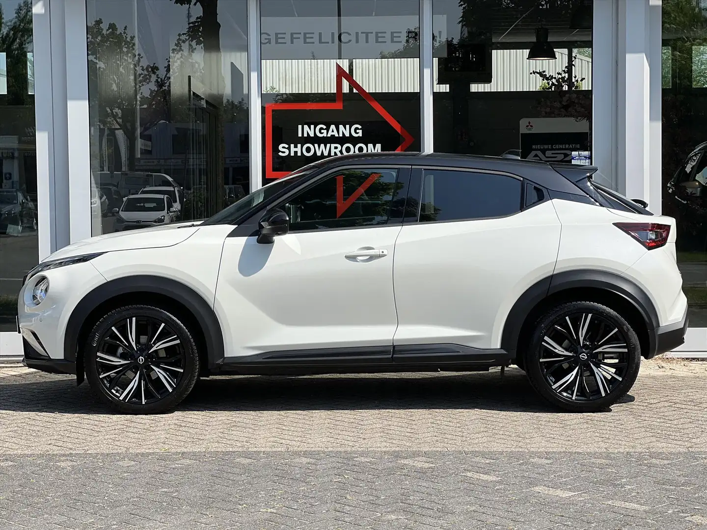 Nissan Juke 1.0 DIG-T 114pk DCT N-Design | Trekhaak | Leder | Wit - 2