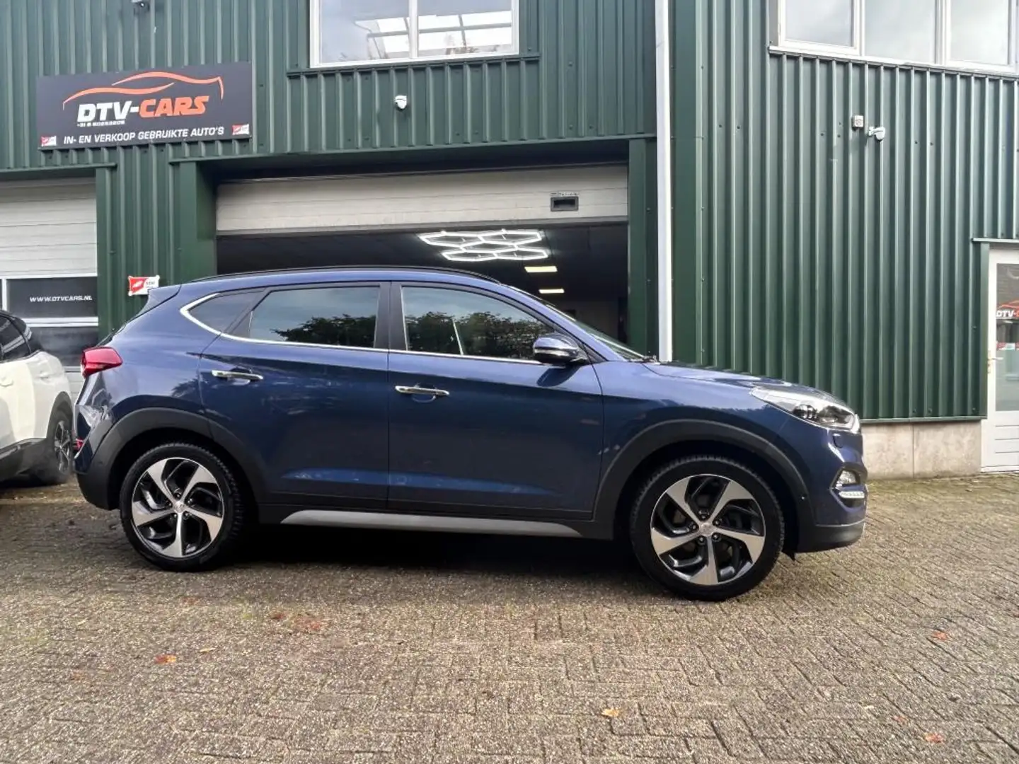 Hyundai TUCSON 1.6 T-GDi Comfort 4WD automaat Pano Full opties Blauw - 2