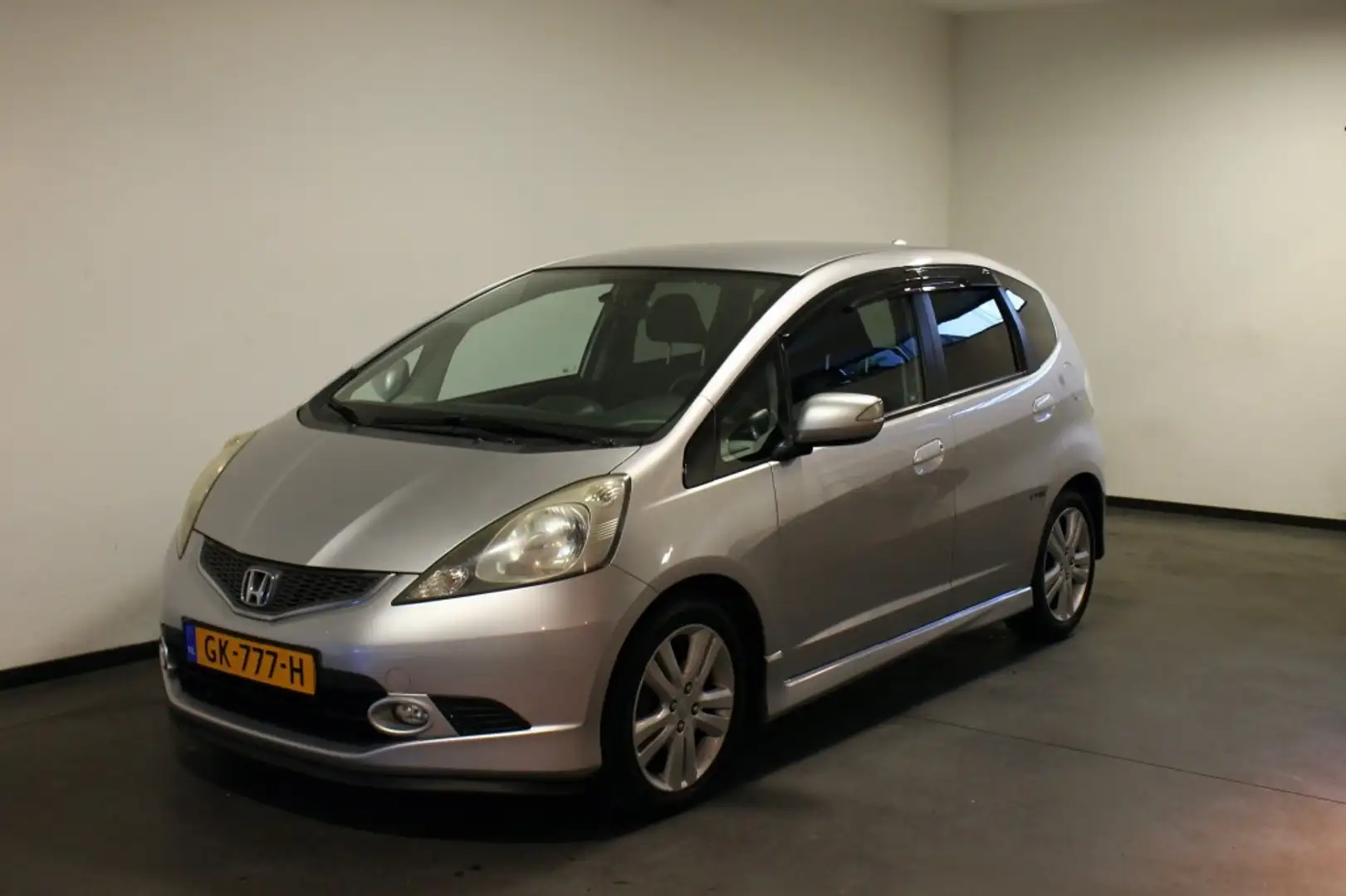 Honda Jazz 1.4 EXCLUSIVE, Airco, Stoelverw, Radio Gris - 1