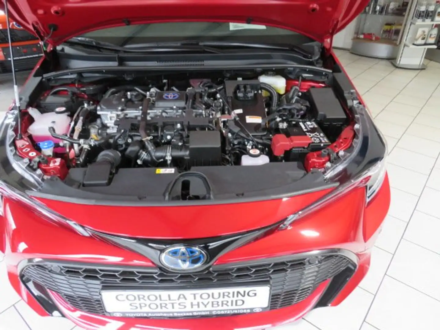 Toyota Corolla Hybrid Team D Touring Sports (E21) Rot - 1