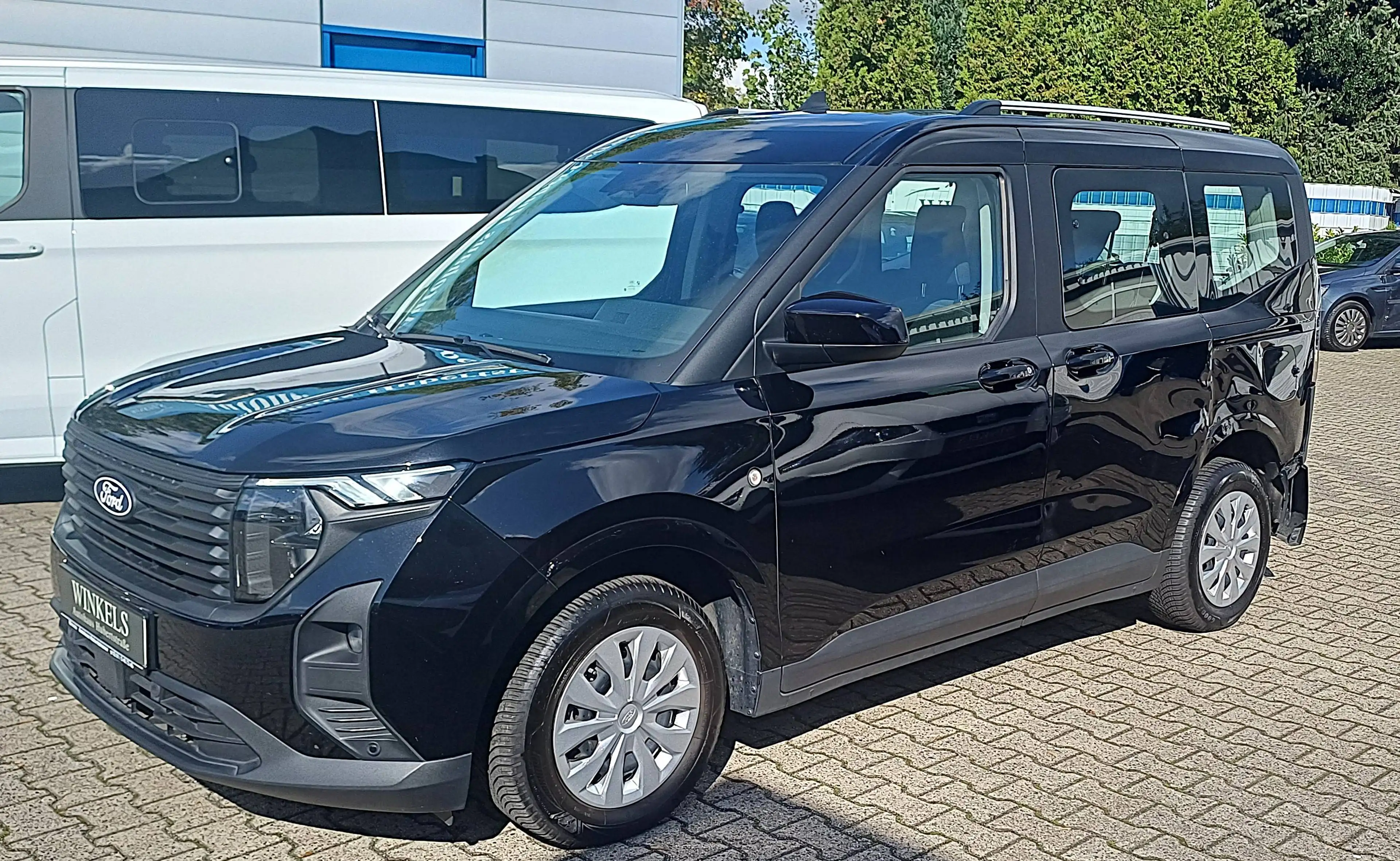 Ford Tourneo Courier Tourneo Courier Trend-Klimaaut-Navi-Kamera-Sitz+Lenkradhzg-Frontscheibenhzg-Spur+Totwinkel-PDC-DAB