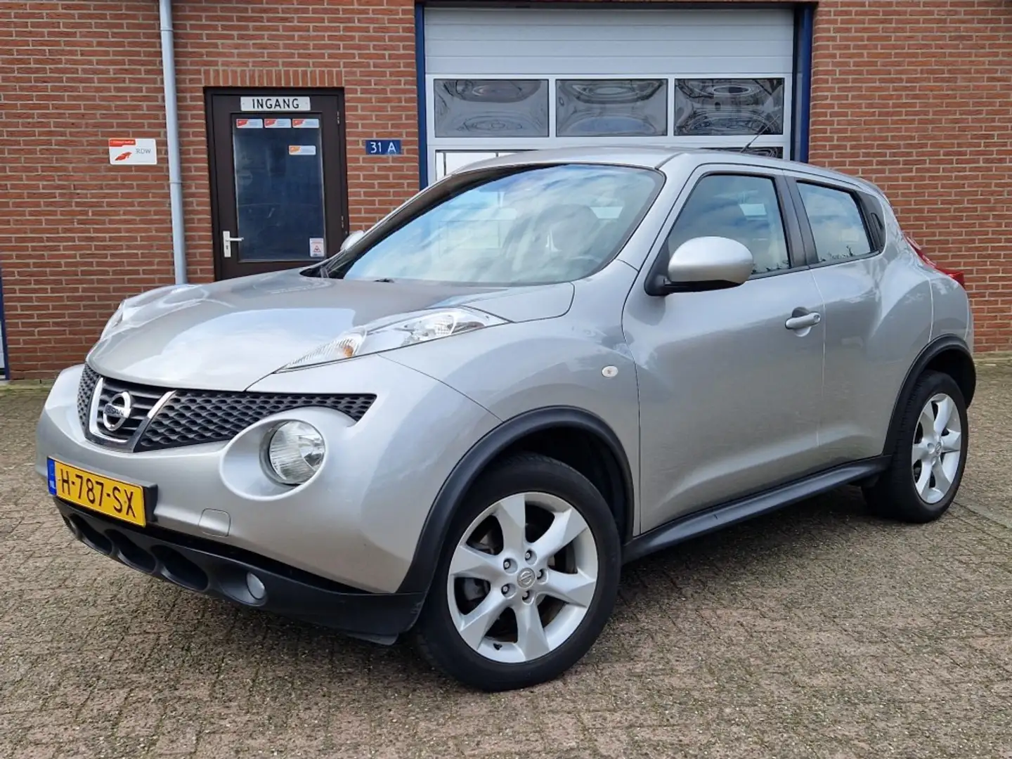 Nissan Juke 1.6i Acenta Navi Climate control Cruise control Grijs - 1