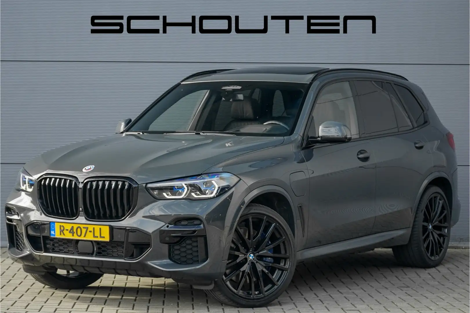 BMW X5 xDrive45e High Ex M-Sport Shadow Individual Pano T Grijs - 1