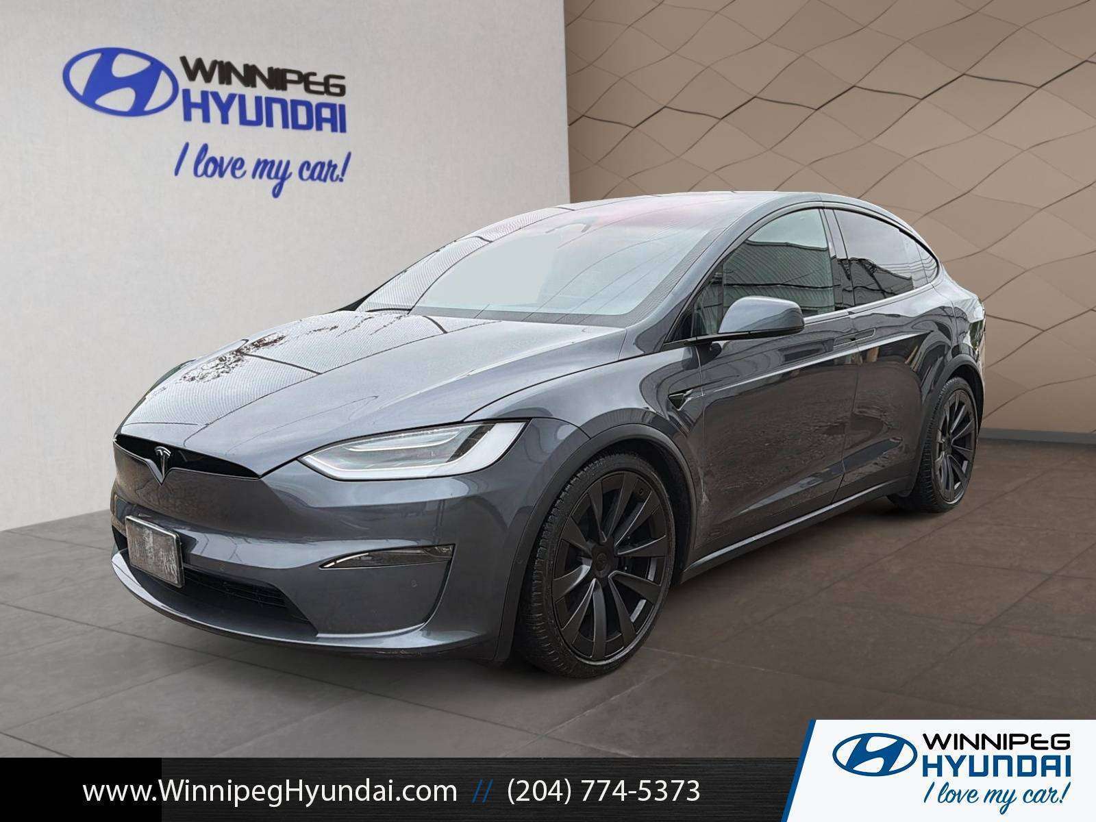 used 2023 Tesla Model X car, priced at $86,759