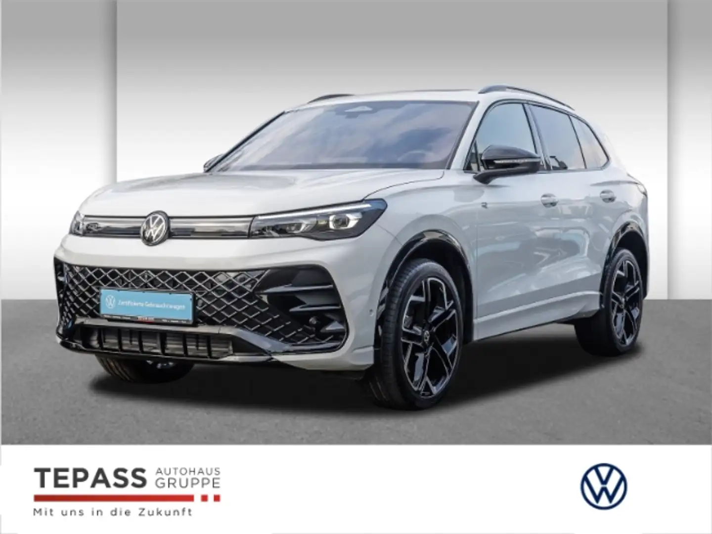 Volkswagen Tiguan 2.0 TDI DSG 4Motion R-LINE NAVI KLIMA PANO STANDHE Wit - 1
