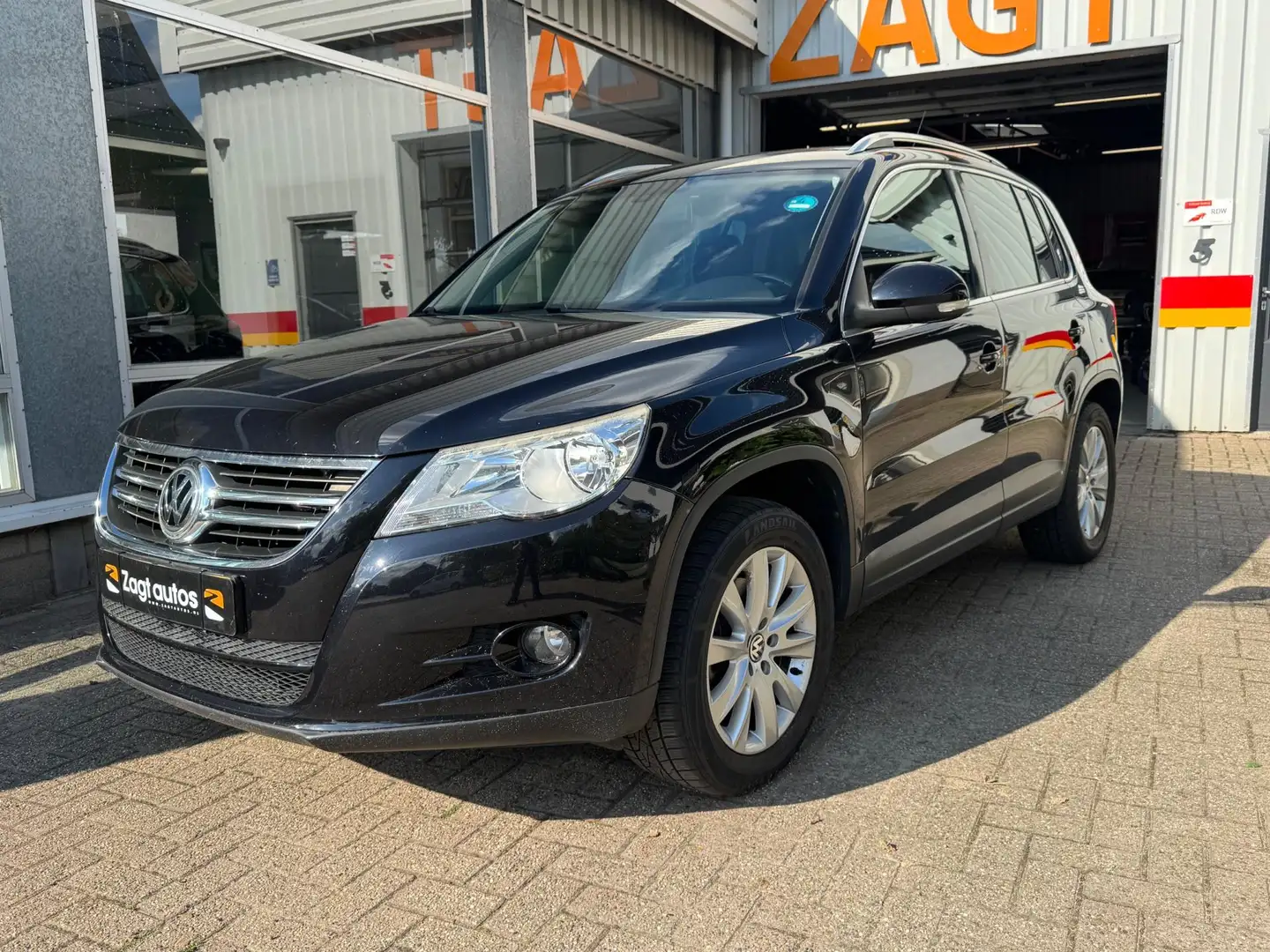 Volkswagen Tiguan 1.4 TSI Sport&Style 4Motion Zwart - 1