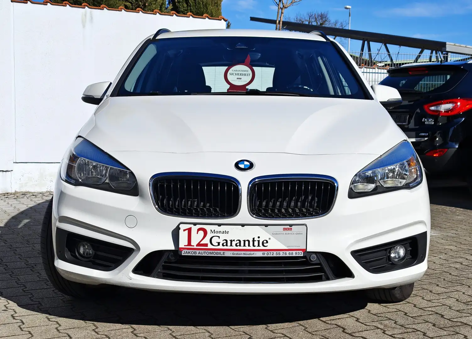 BMW 218 TÜV Neu Anhängerkup. Allrad NAVI PDC Sitzhei Weiß - 2