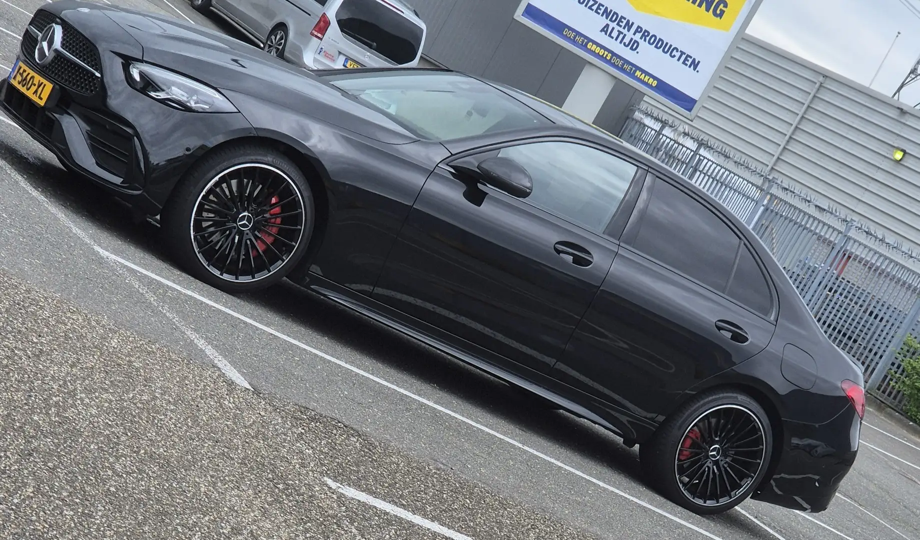 Mercedes-Benz C 300 e 9G-TRONIC AMG Line Zwart - 1