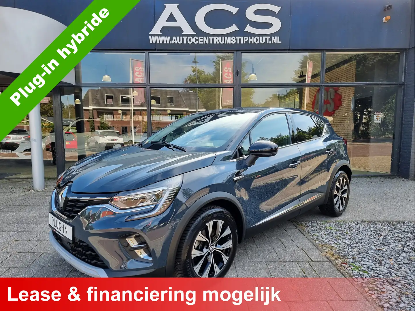 Renault Captur 1.6 E-Tech Plug-in Hybrid 160pk Intens+ | Super ui Oranje - 1