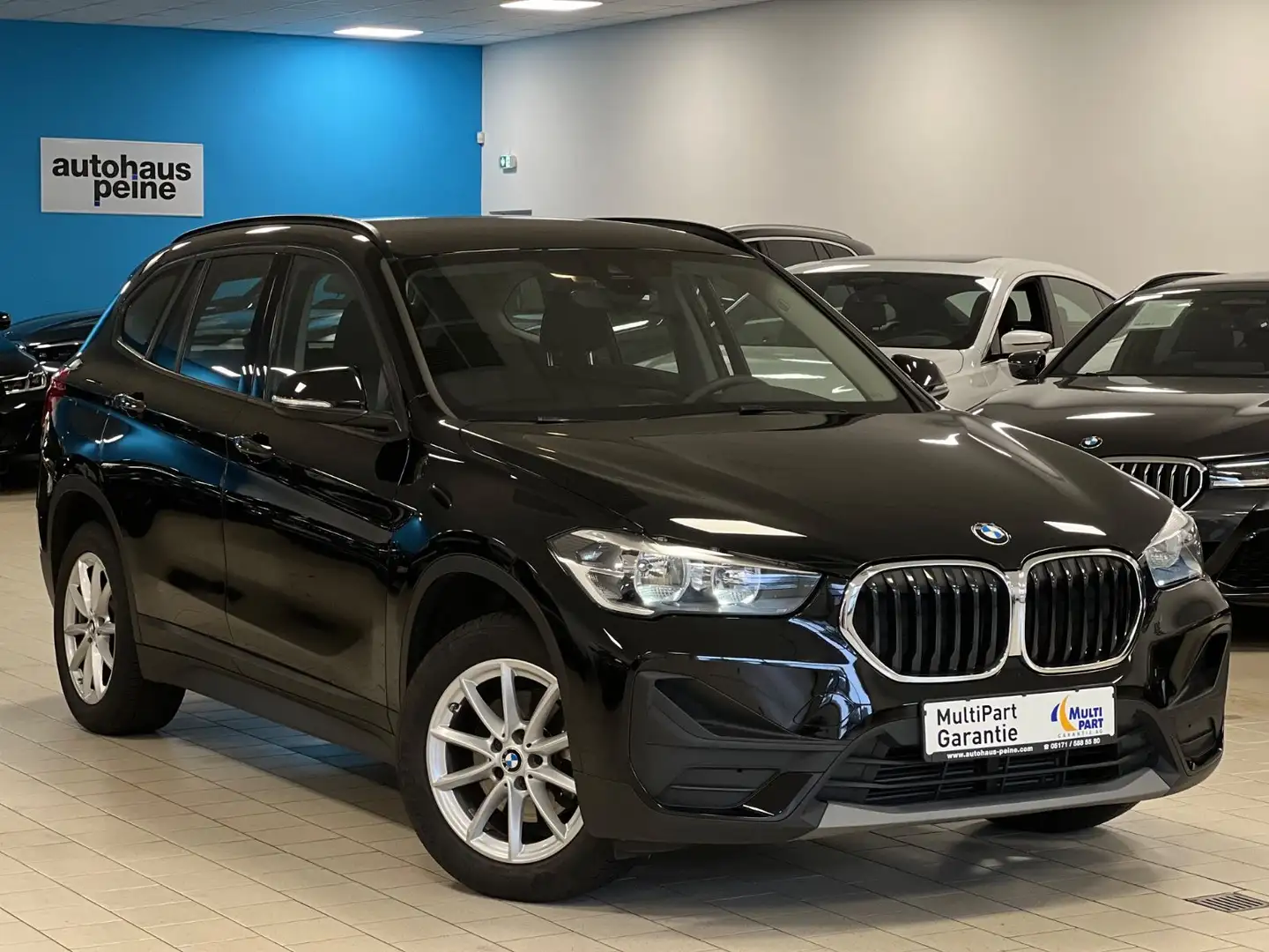 BMW X1 sDriv18i/NaviPortab/PDC/Tempomat/Alu/Advantage Schwarz - 1