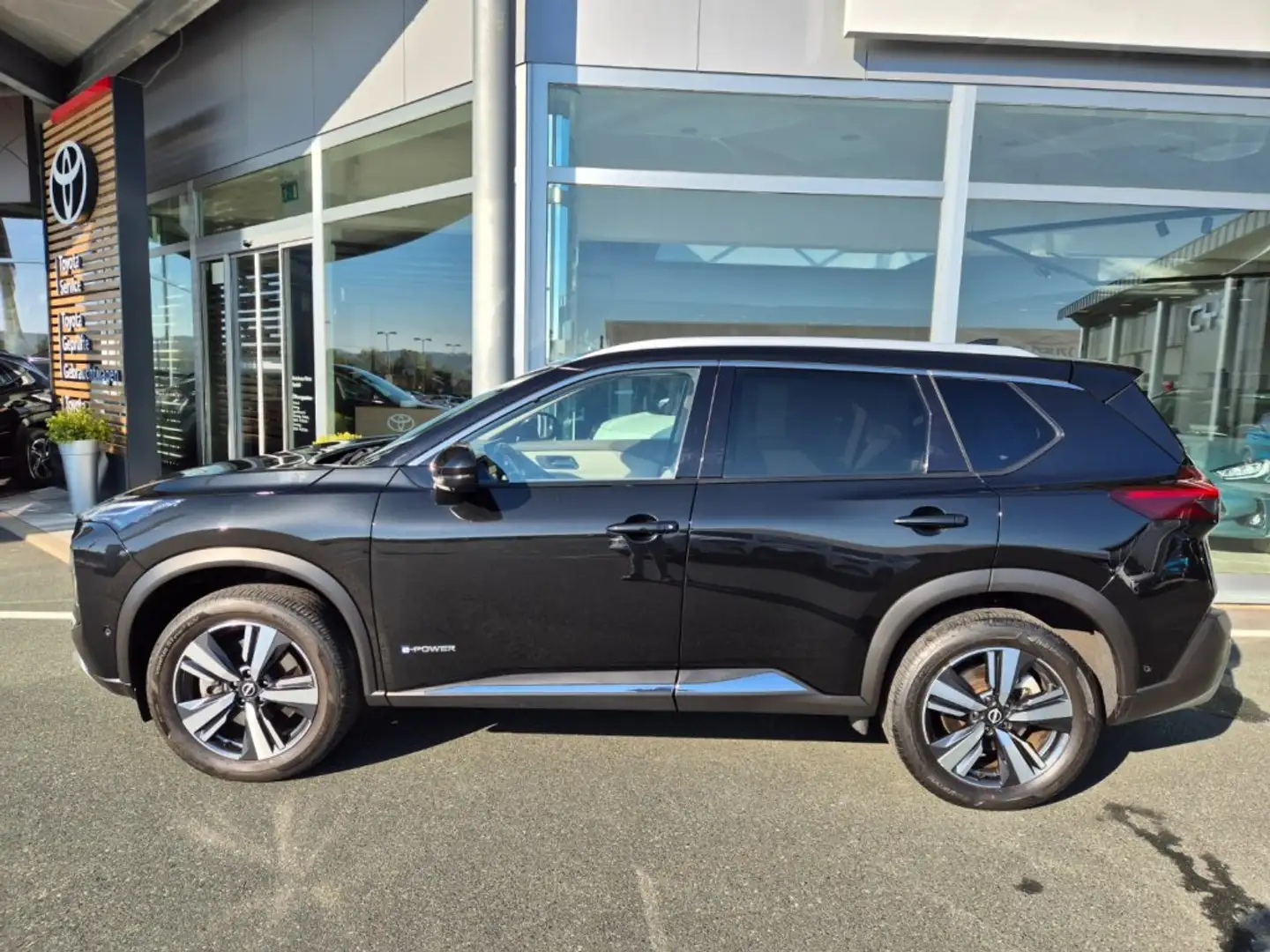 Nissan X-Trail 1,5 VC-T e-Power 4FORCE AWD TEKNA+ *8-Fach*AHV* Zwart - 2