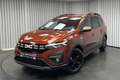 Dacia Jogger 1.6i HEV / Navi / Cam / BLISS / LED / PDC / ... Orange - thumbnail 1