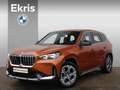 BMW iX1 xDrive30 67 kWh X-Line / Harman Kardon / Comfort A Oranje - thumbnail 1