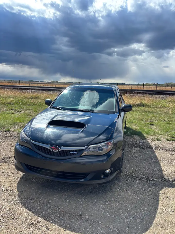 Subaru Impreza снимка Subaru Impreza
