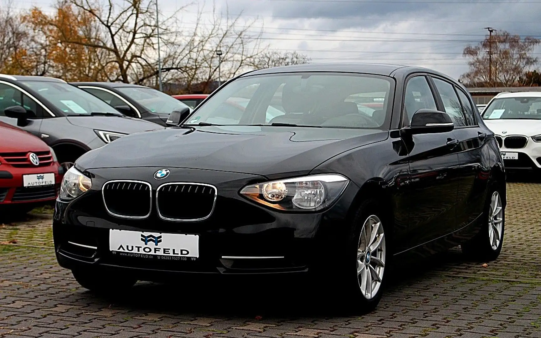 BMW 116 i Sport Line/SHZ/PDC/KLIMA/BT/5TÜRIG Schwarz - 1