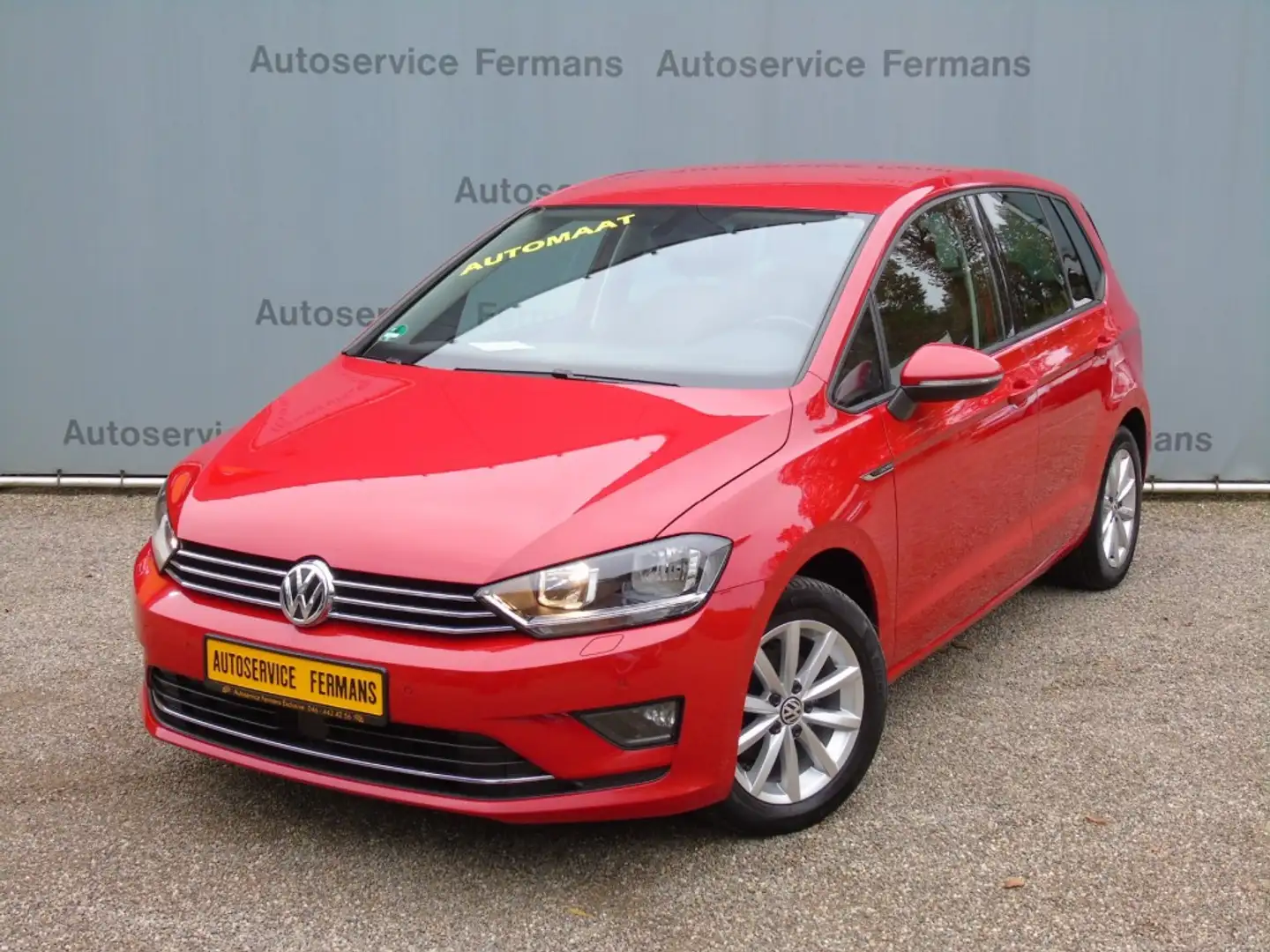 Volkswagen Golf Sportsvan 1.2TSI 110PK DSG Lounge - 2015 - Automaat - Trekha Rood - 2