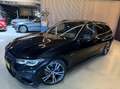 BMW 330 3-serie Touring 330e xDrive High Executive Zwart - thumbnail 48