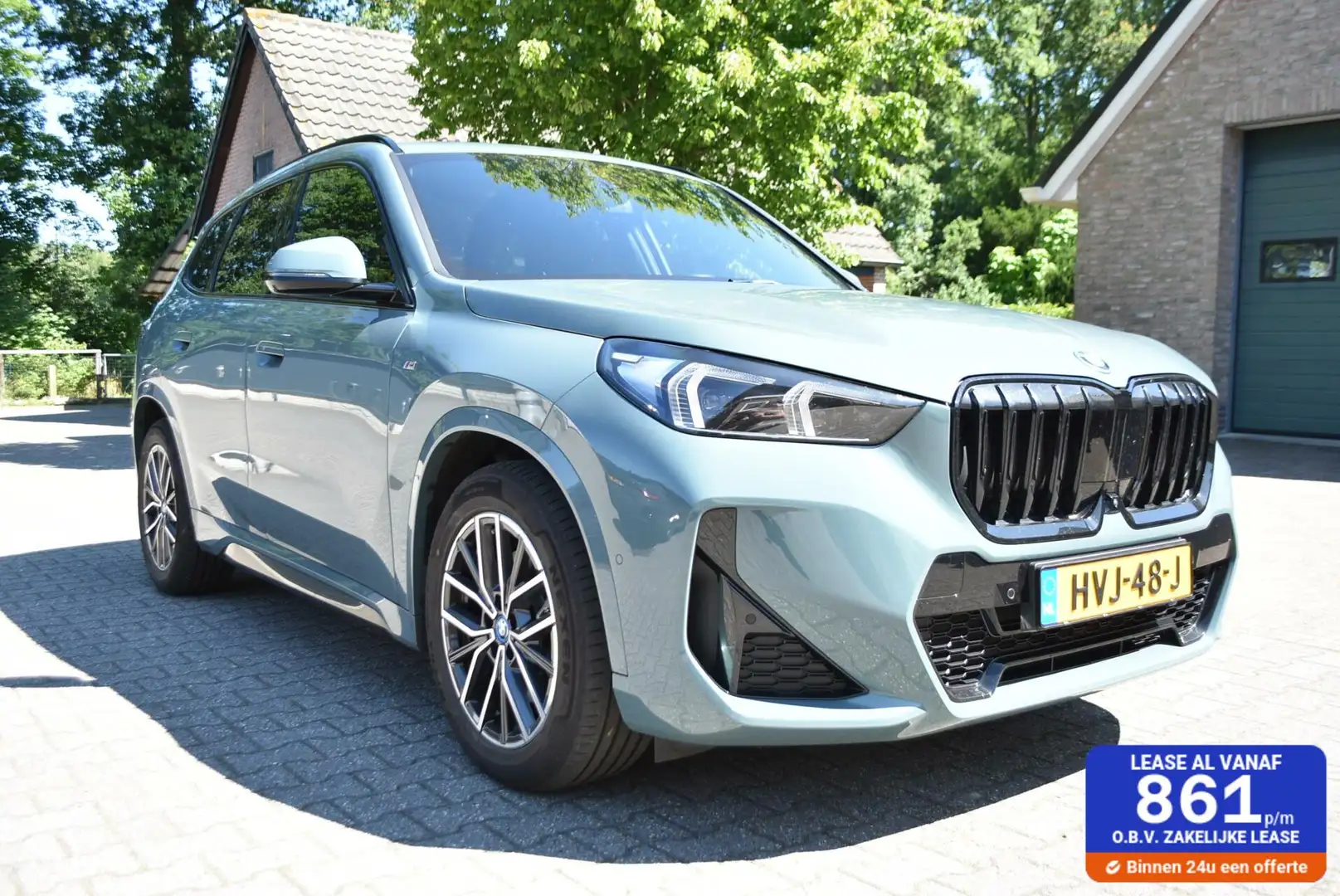 BMW X1 2.5 E X Drive aut Hybrid M Sportpakket X1 2.5E X D Groen - 1