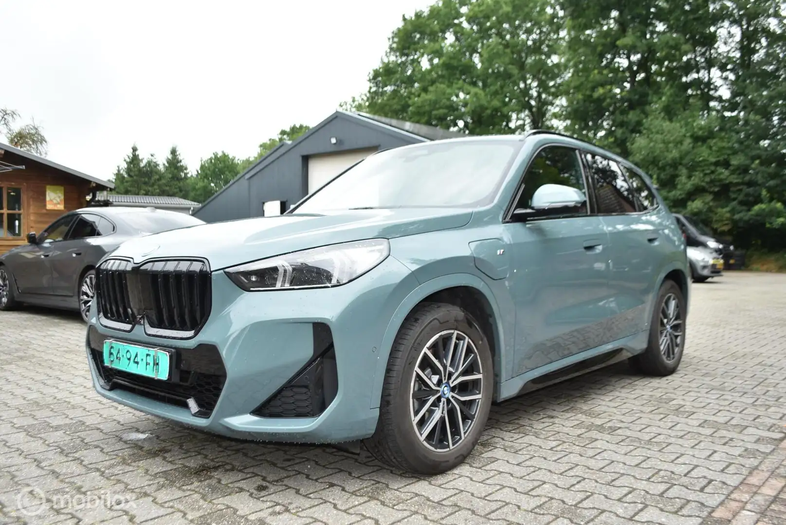 BMW X1 2.5 E X Drive aut Hybrid M Sportpakket X1 2.5E X D Groen - 2