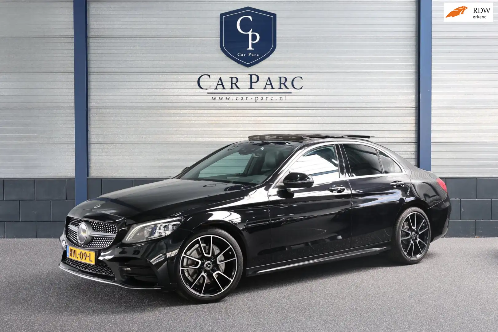 Mercedes-Benz C 200 AMG Line LED/VIRTUAL/SFEER/PANORAMADAK/LEER+S.VERW Zwart - 1