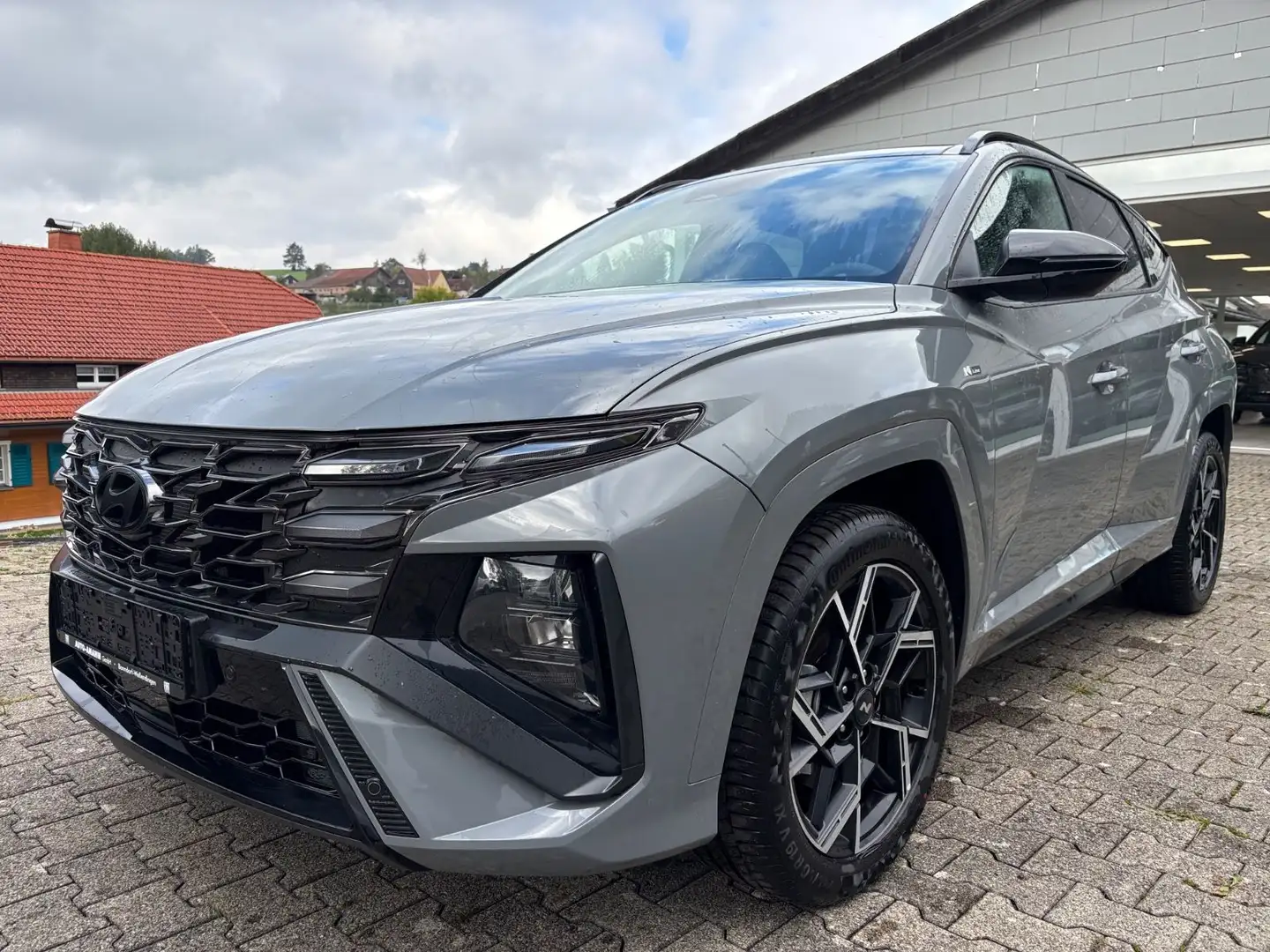 Hyundai TUCSON 1.6 T-GDI ALLRAD,NAVI, AUTOMATIK, KAMERA Grijs - 1
