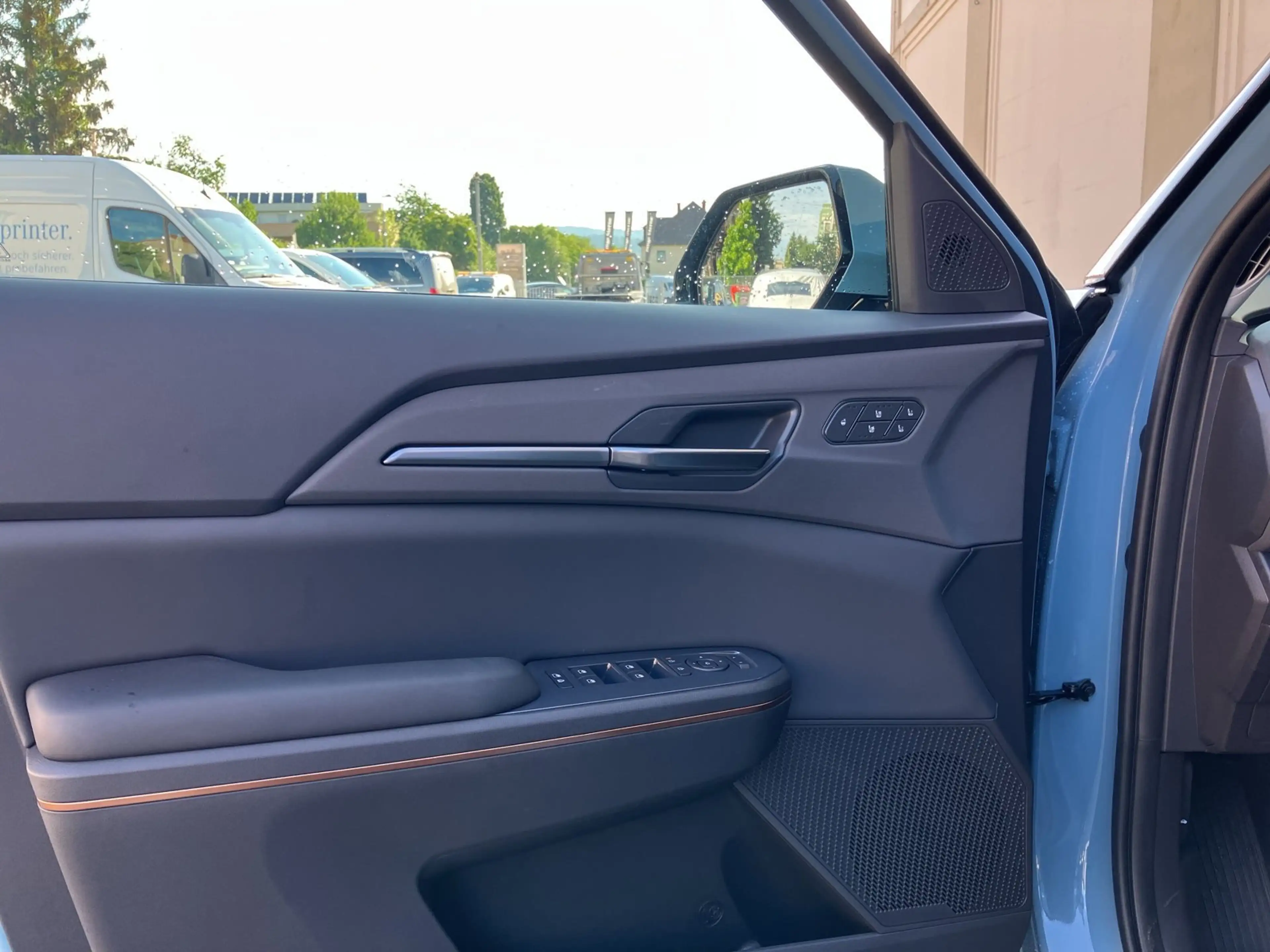 Kia EV5 EARTH *7 Jahre Werksgarantie, Sitzklima, Teilleder — photo 11