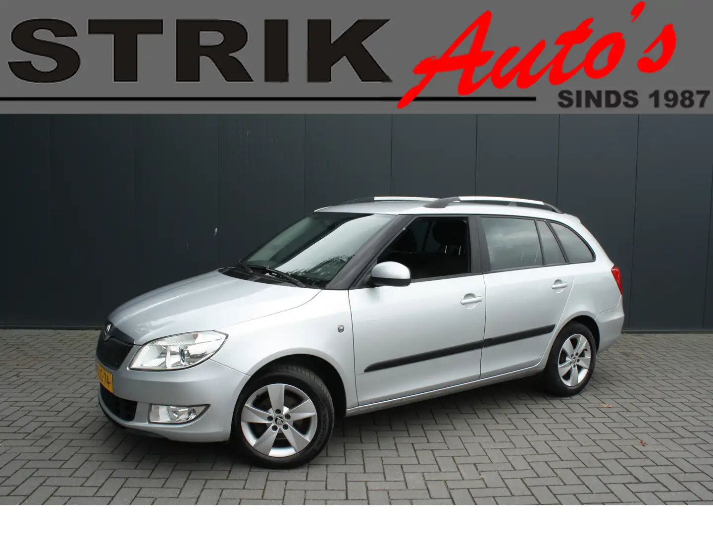 Skoda Fabia Combi 1.2 TSI Drive - NAVIGATIE - TREKHAAK - PARKE Grau - 1