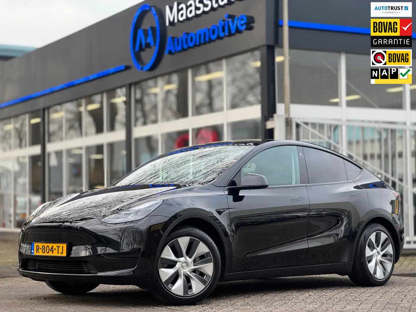Tesla Model Y RWD 58 kWh Panodak Autopilot Topstaat 2022 Zwart - 1