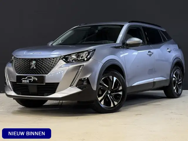 Peugeot e-2008 EV Allure 50 kWh | SOH 99% | Draadloze lader | Sto