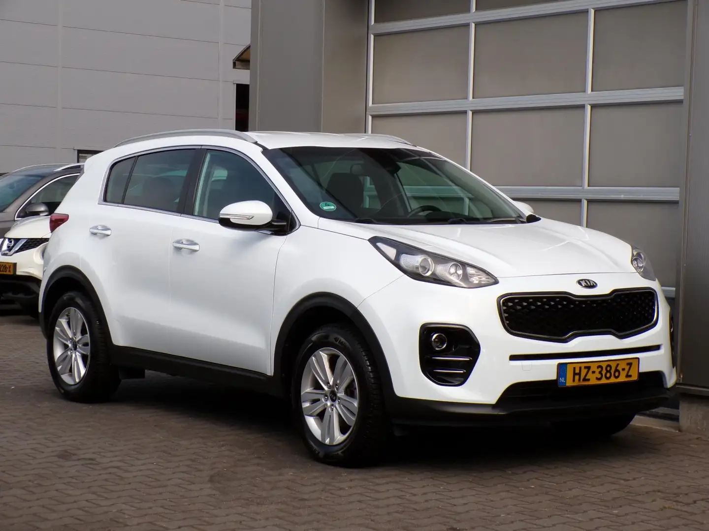 Kia Sportage 1.6 GDI DynamicLine|Navi|Cruise|Cam|Trekh.|PDC Wit - 1