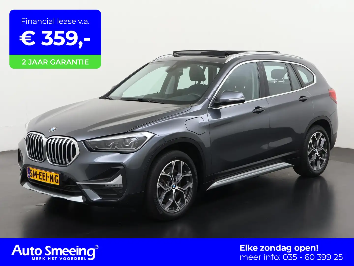 BMW X1 xDrive25e xLine | Panoramadak | Leder | Camera | Z Grijs - 1