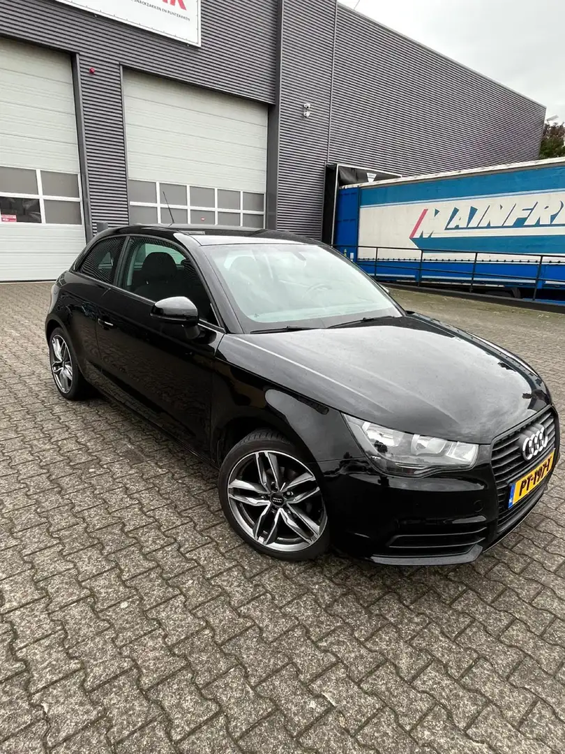 Audi A1 1.2 TFSI Amb. PL. Zwart - 1