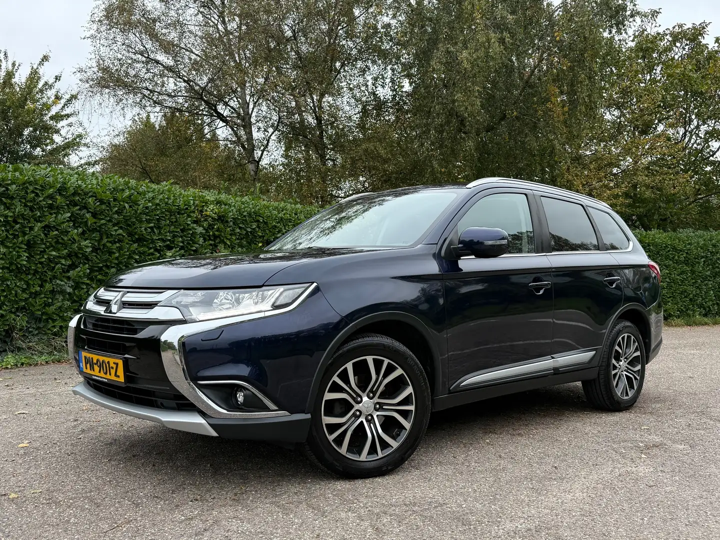 Mitsubishi Outlander 2.0 Executive Edition Automaat | 7 Persoons | Came Bleu - 1