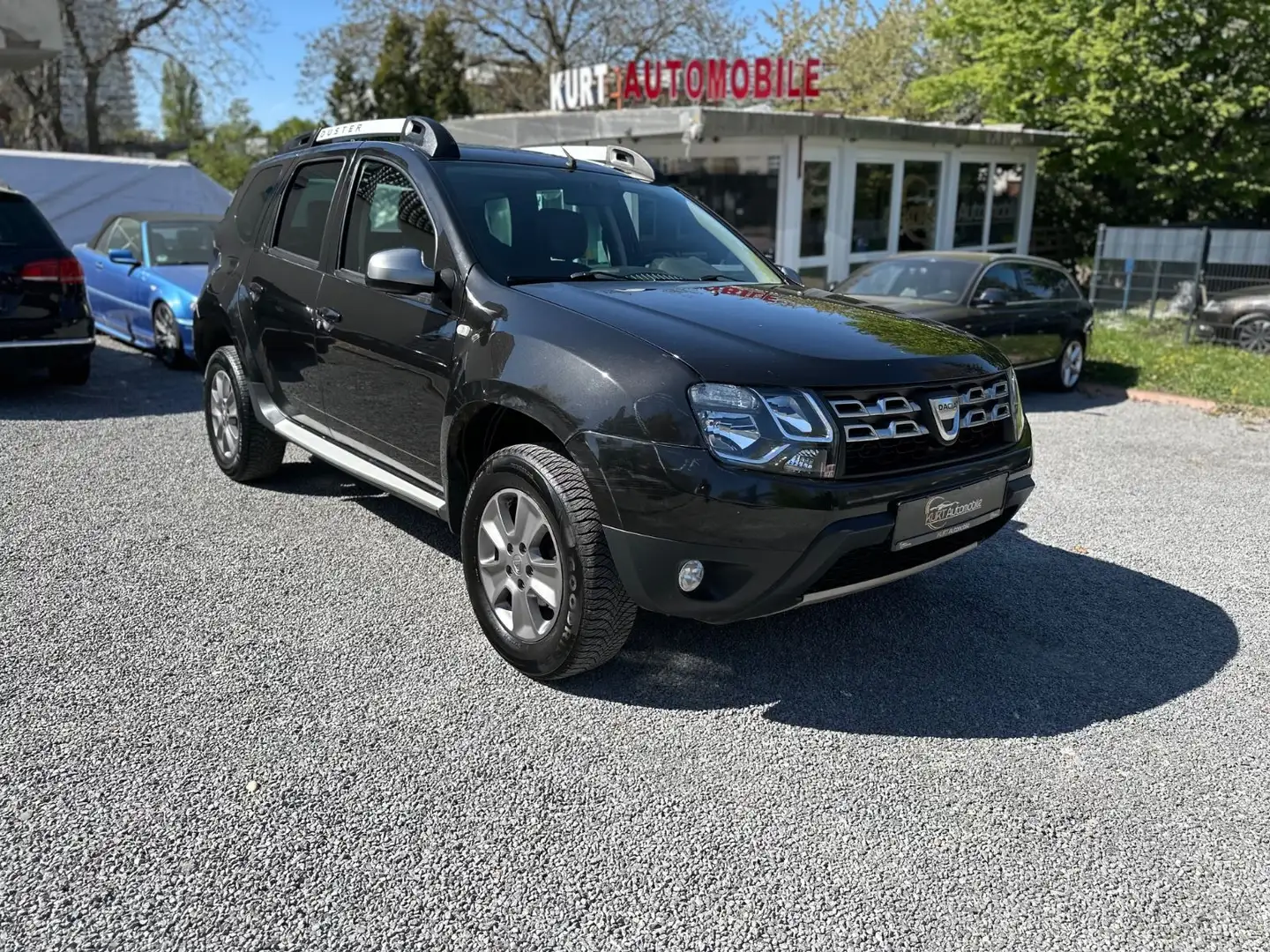Dacia Duster I Prestige 4x2-NAVI-LPG+BENZIN-Zahnr.2.22 Schwarz - 1