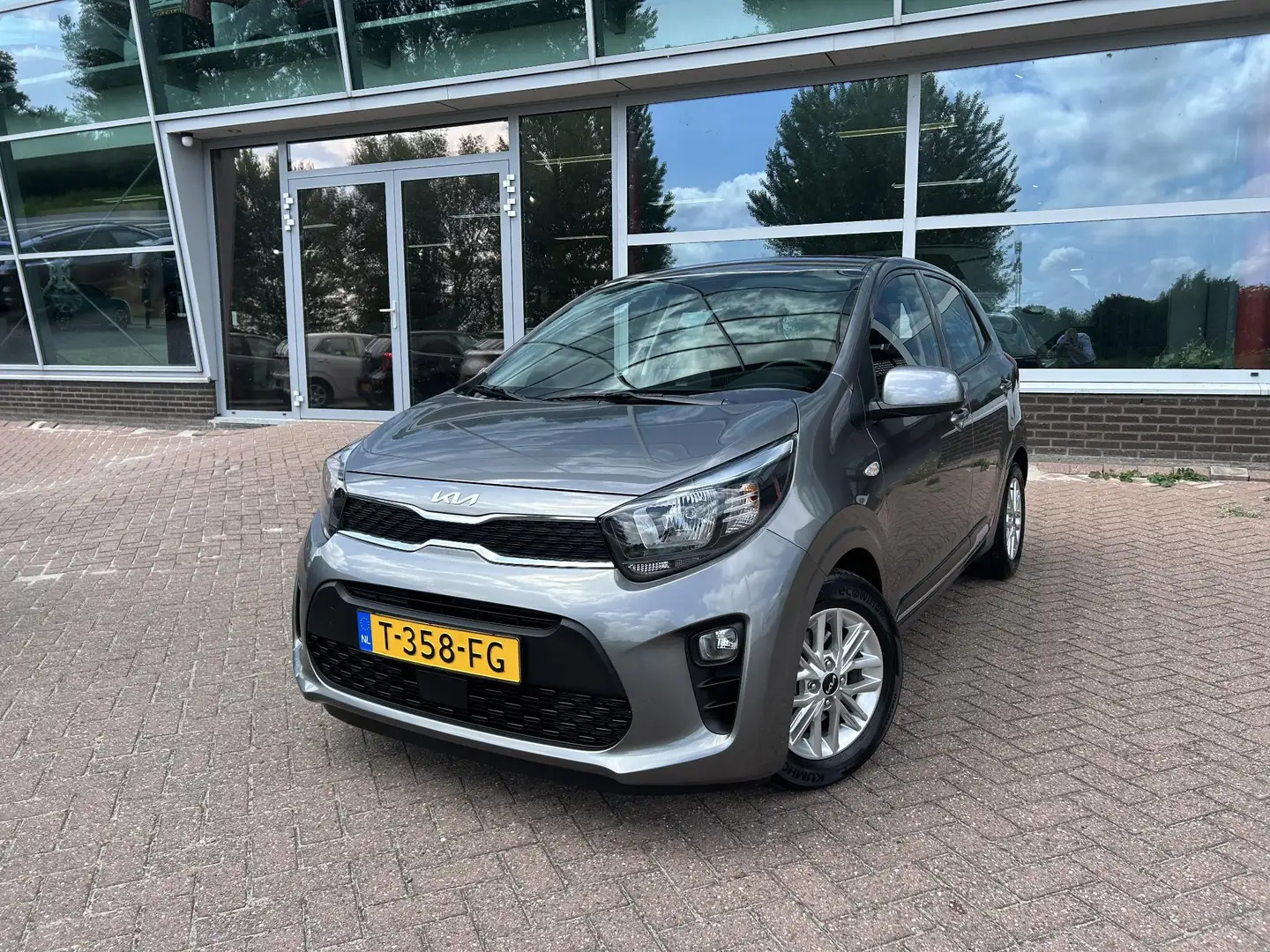 Kia Picanto 1.0 DPi DynamicLine Nieuw geleverd | Dealeronderho Grijs - 1