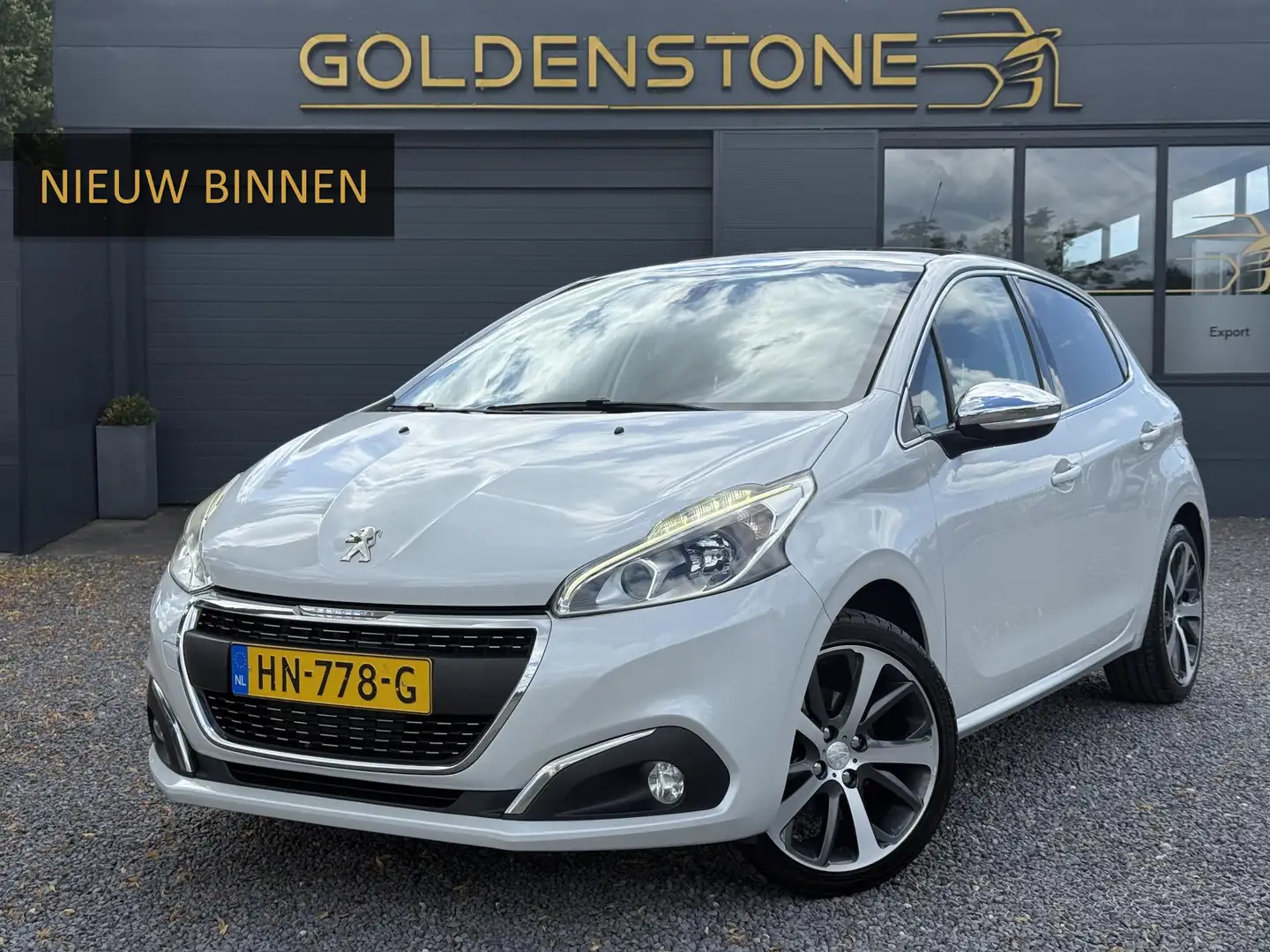 Peugeot 208 1.2 PureTech Première 2e Eigenaar,Navi,Pano,110pk, Wit - 1