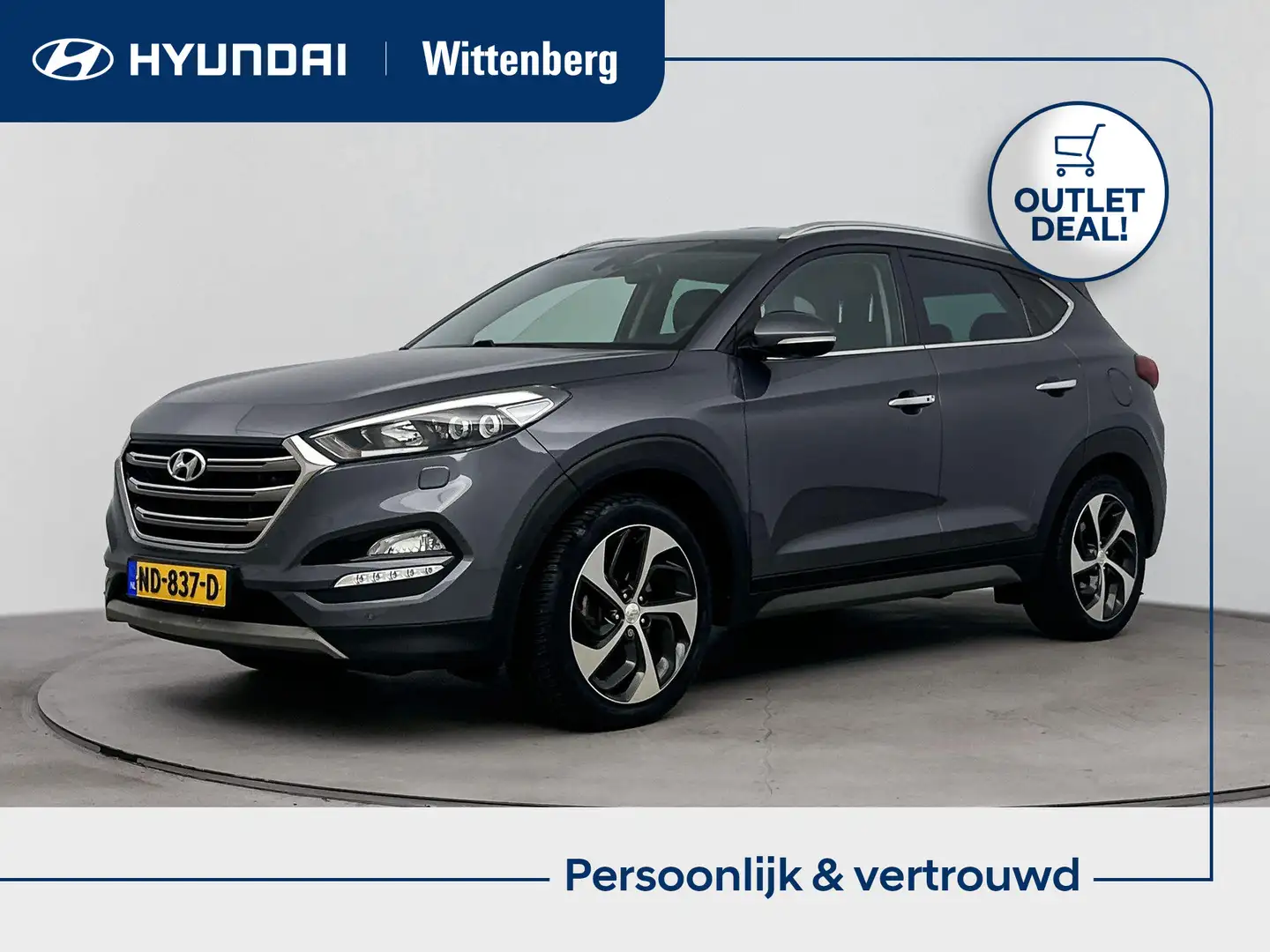 Hyundai TUCSON 1.7 CRDi HP PREMIUM *| OUTLETDEAL! | UNIEK! | TREK Gris - 1