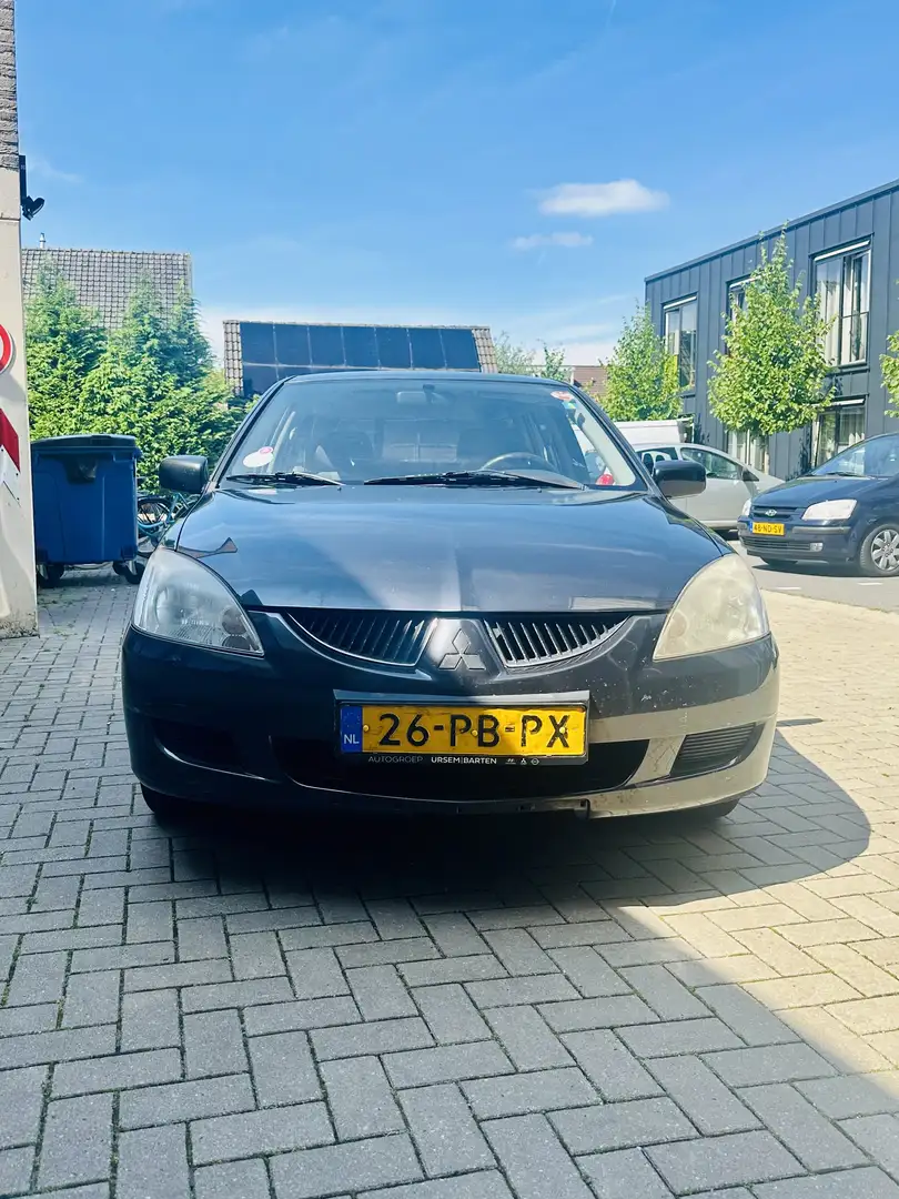 Mitsubishi Lancer Kombi 1.6 Comfort Grijs - 1