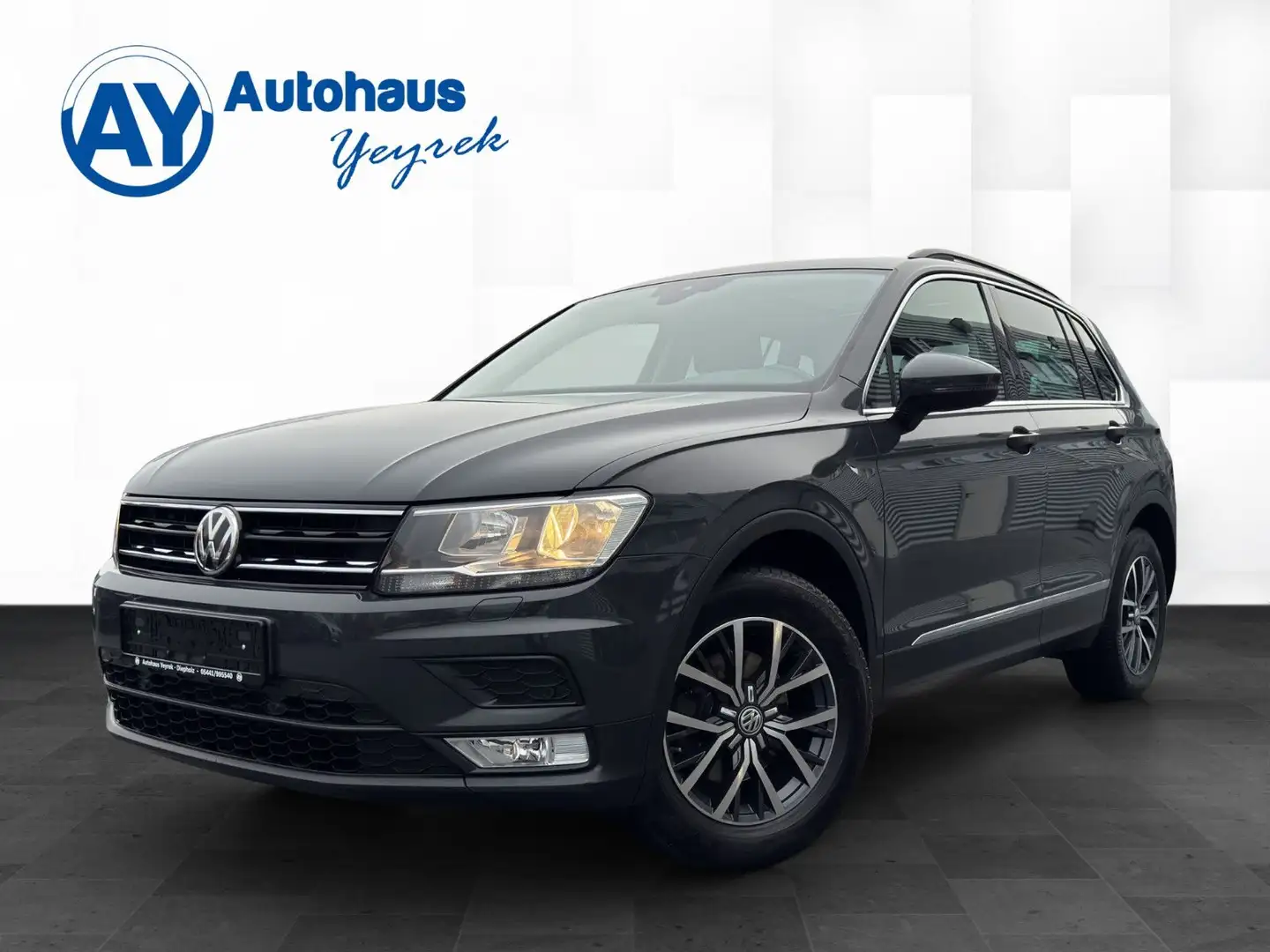 Volkswagen Tiguan 2.0 TDI DSG 4x4 *ACC*AHK*SHZ*PANO*Sound* Grau - 1