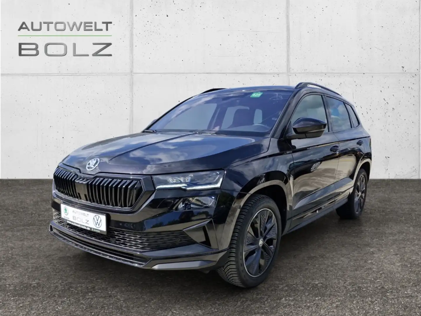 Skoda Karoq Sportline 4x4 2.0 TSI Panodach Navi LED Kamera PDC Schwarz - 1