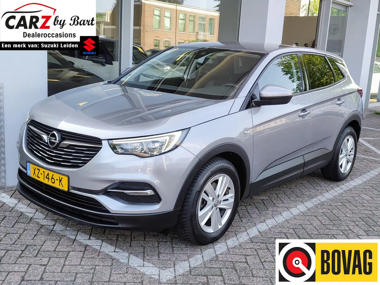Opel Grandland X 1.2 TURBO ONLINE EDITION+ Navi | Trekhaak | Carpla Grijs - 1