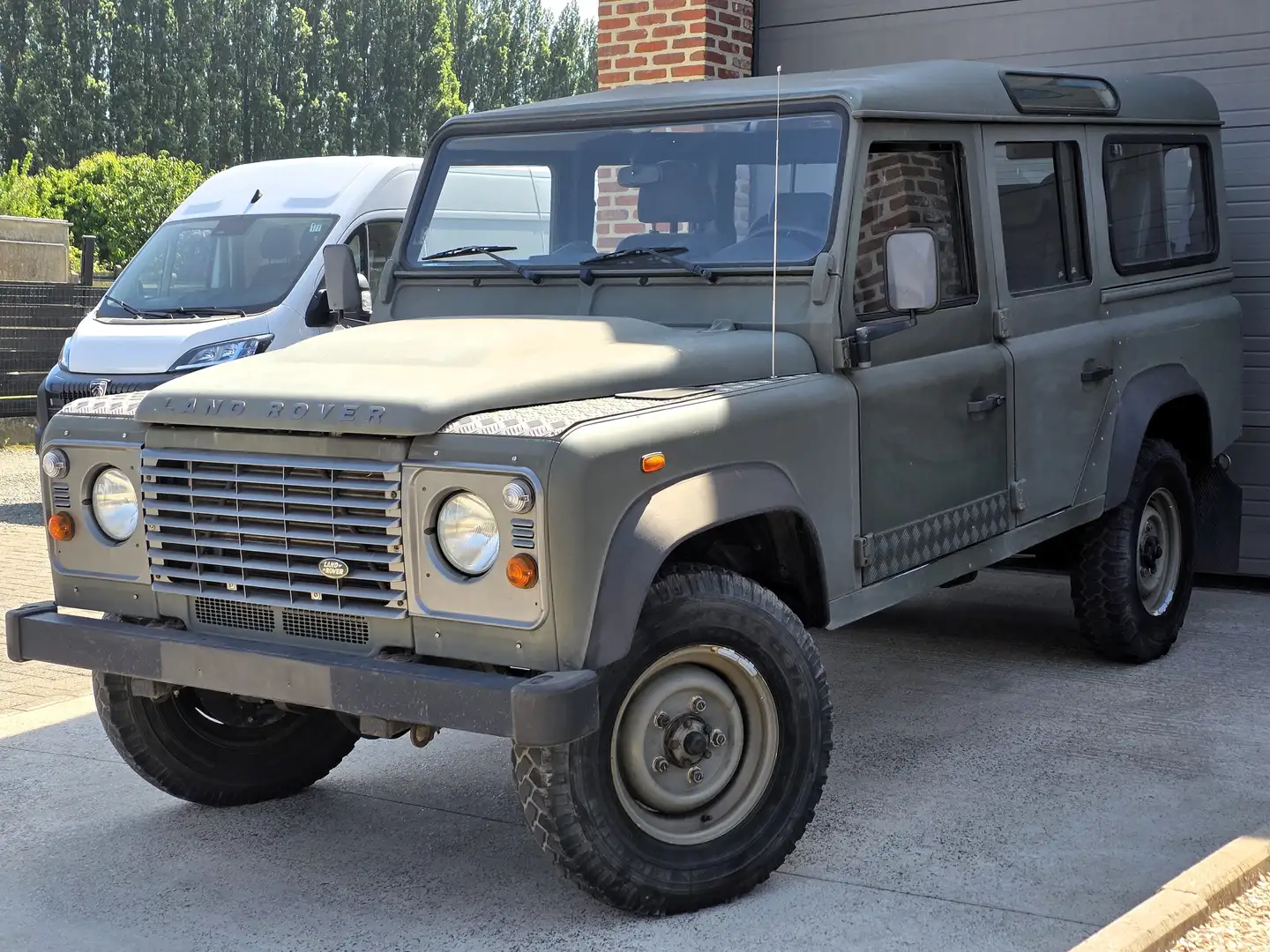 Land Rover Defender 110 TD4 - 2009 - 124.000 KM - 7 Zits - 4X4 Зелений - 1