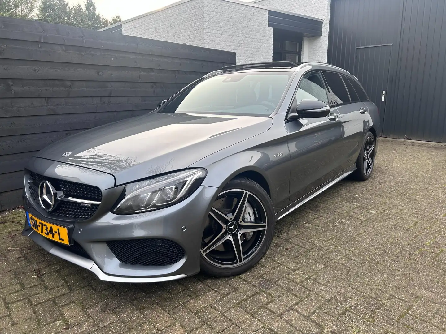 Mercedes-Benz C 43 AMG Estate 4MATIC, Pano, Dealer Onderh. Sfeerverlichti Grijs - 1