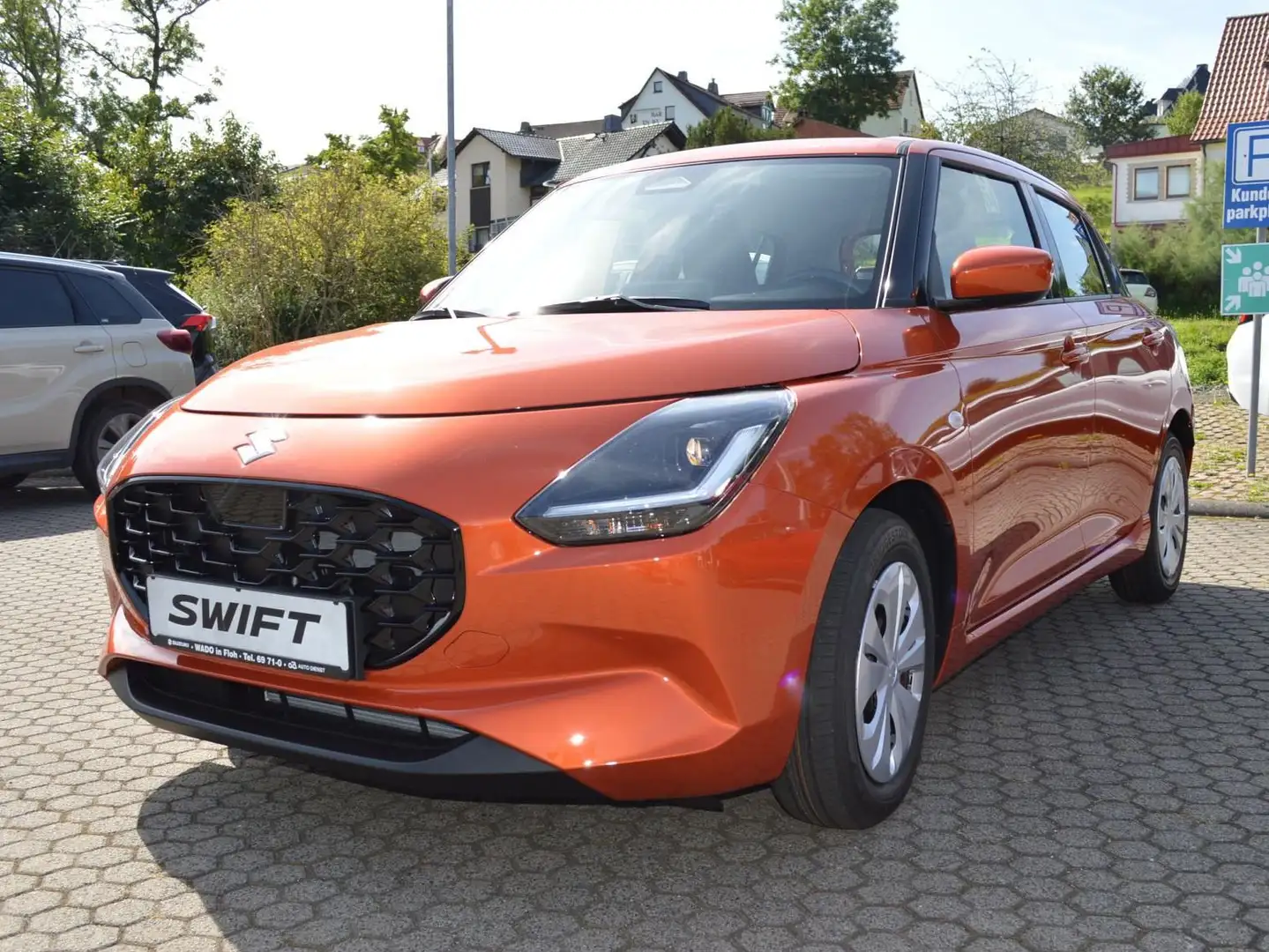 Suzuki Swift 1.2 Hybrid MT Club Oranje - 1