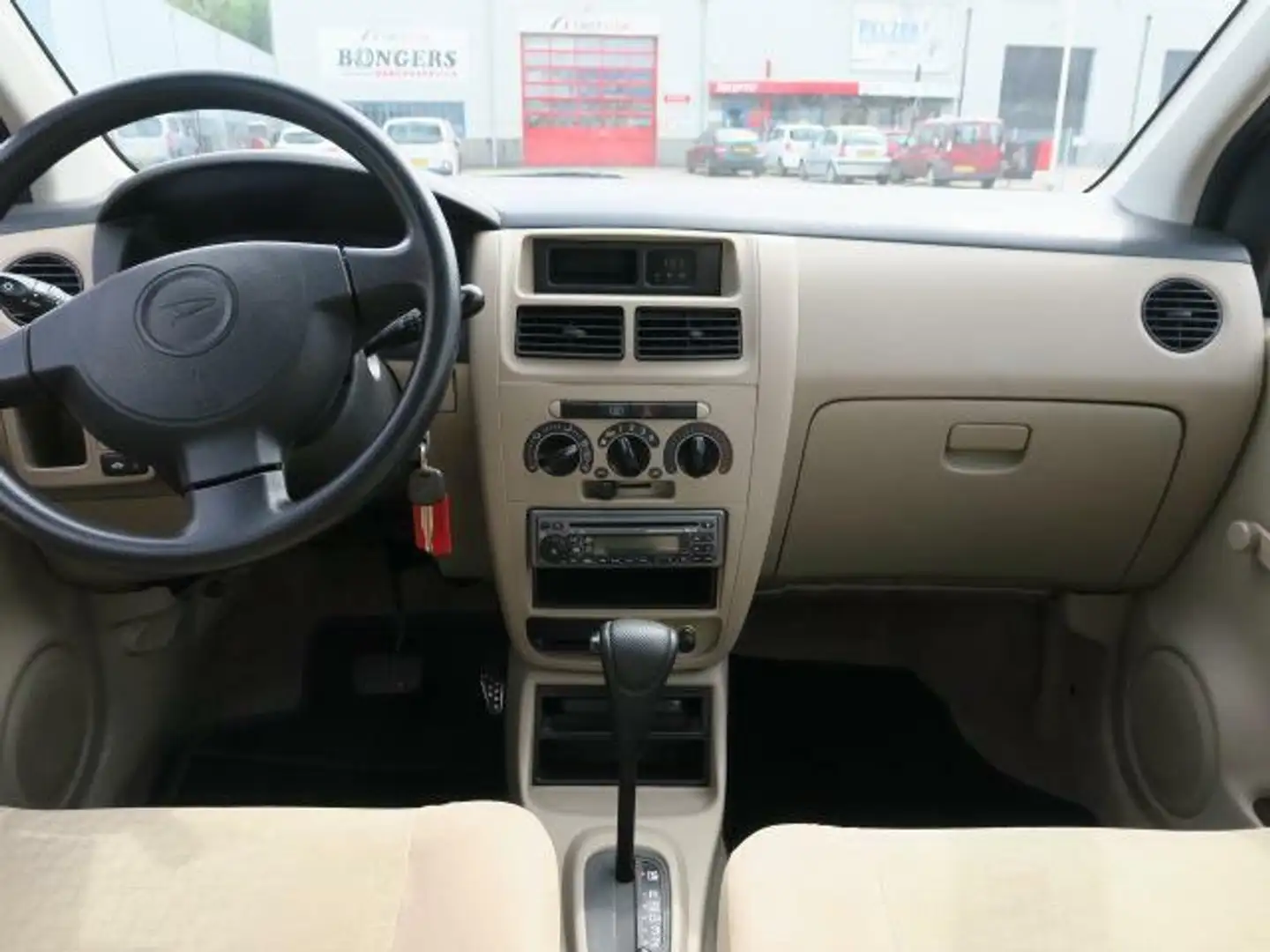 Daihatsu Cuore 1.0-12V Azure, automaat, 5 deurs, stuurbekrachtigi Grau - 2