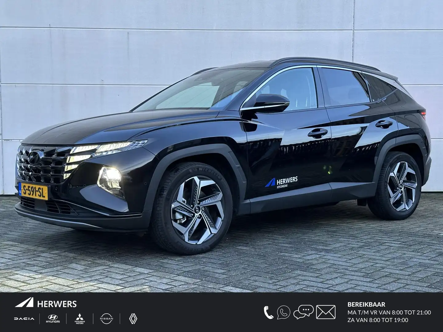 Hyundai TUCSON 1.6 T-GDI PHEV Premium 4WD / Krell / Navigatie / S Zwart - 1
