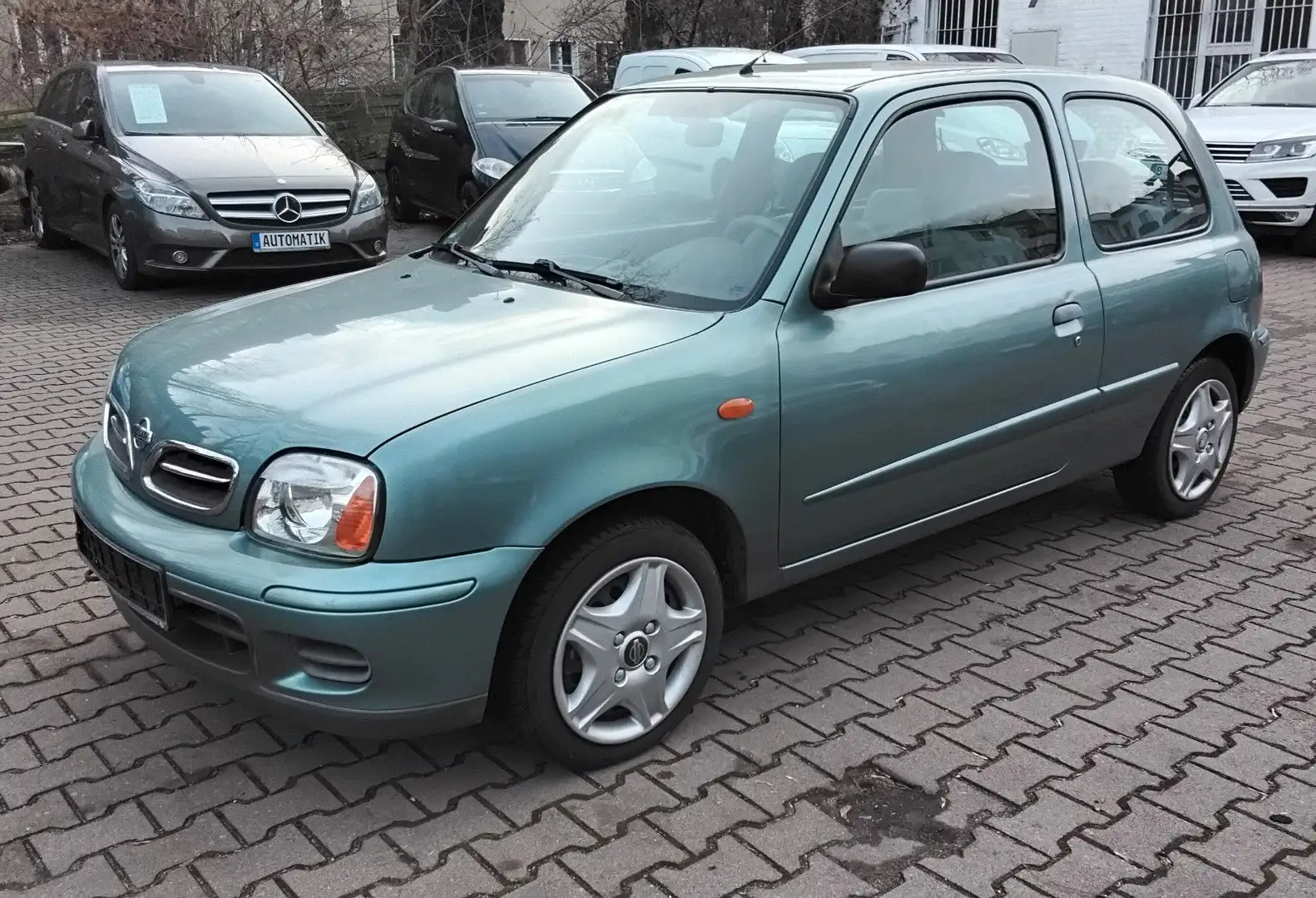 Nissan Micra 1.0 Elegance   Neuer Tüv Gris - 1