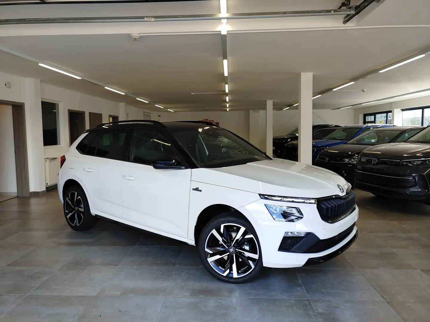 Skoda Kamiq 1.0 TSI DSG Monte Carlo Matrix/Kam/Pano/SmartLink Weiß - 1