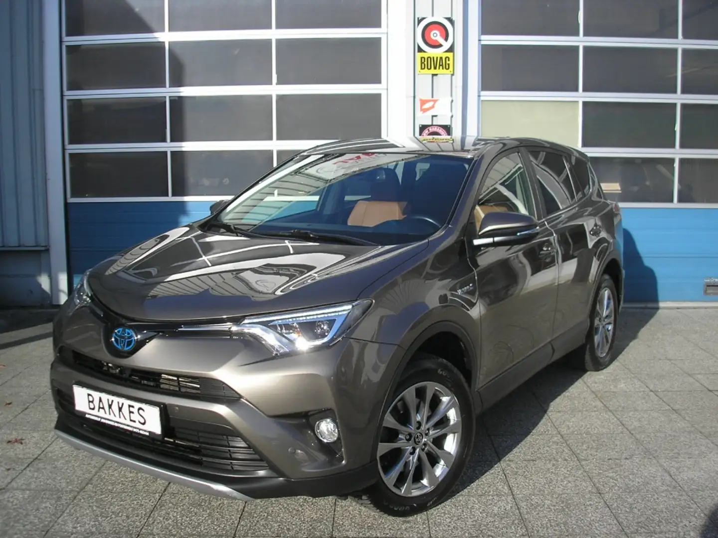 Toyota RAV 4 Hybrid Executive AWD 1650 kg trekgewicht Bruin - 1