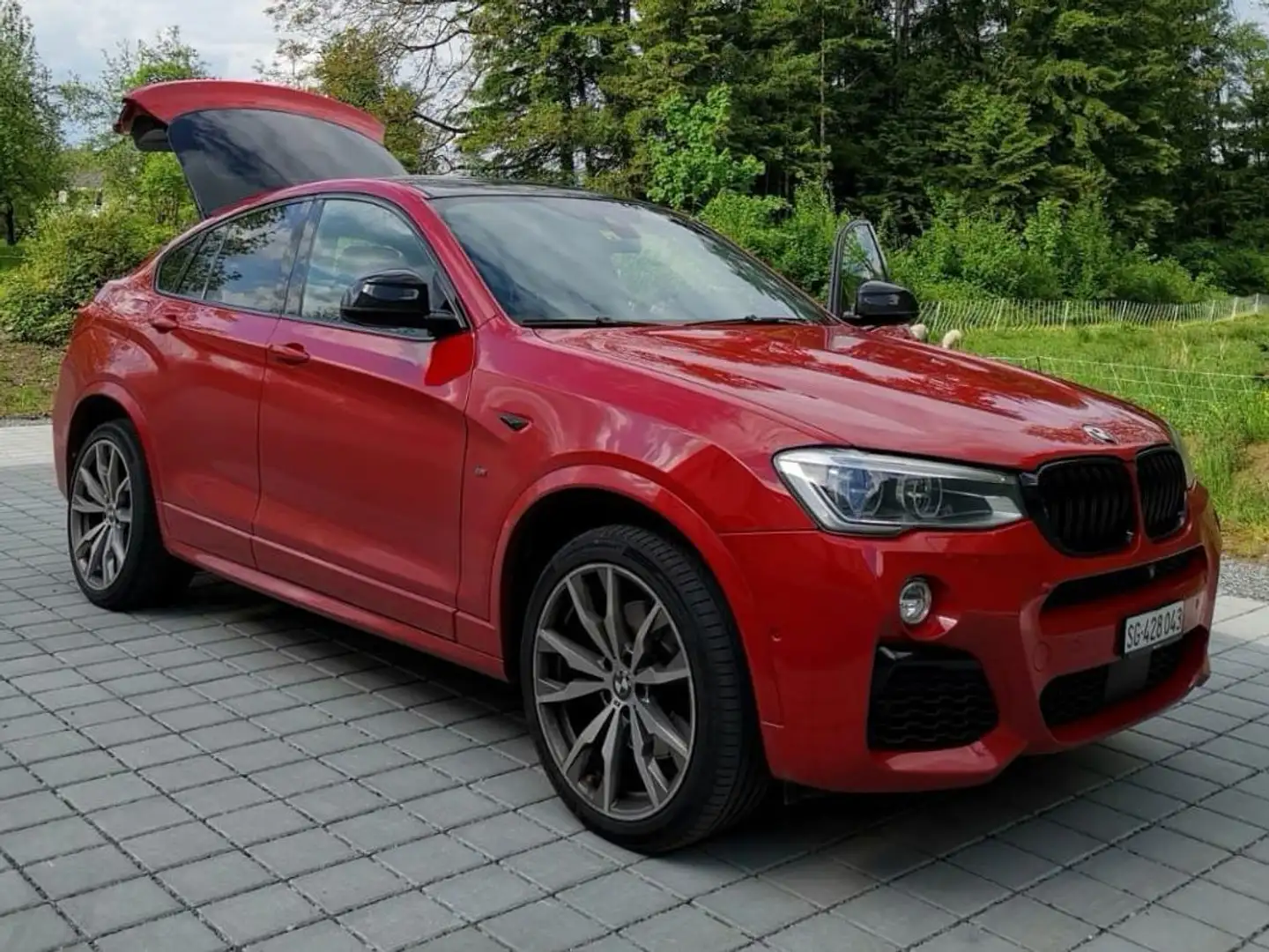 BMW X4 M X4 M40i CH Fahrzeug Rosso - 1